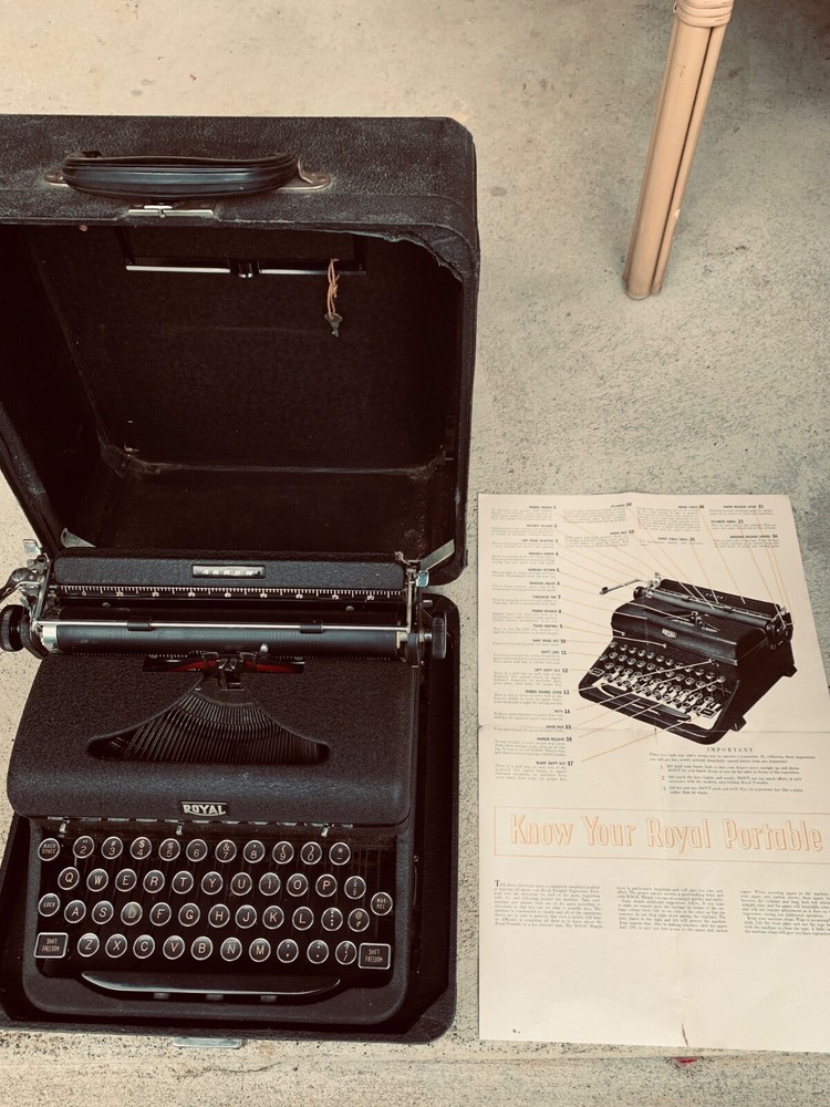 1930s royal arrow portable typewriter, case with key, original pamphlets