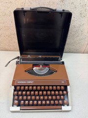 Vintage Sovereign Compact 720 Manual Typewriter Brown Silver Seiko Japan