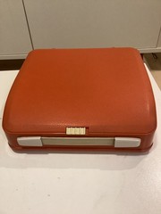 HERMES BABY TYPEWRITER. POP ART. CURSIVE TYPEFACE. SPANISH LAYOUT. ORANGE