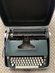 Portable Smith Corona Super Sterling Typewriter with Case